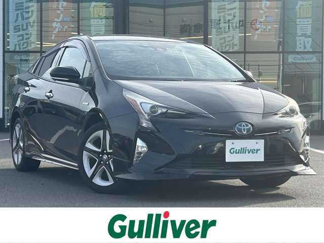 トヨタ プリウス A ツーリングセレクション 岡山県 2015(平27)年 9.7万km アティチュードブラックマイカ 登録時走行距離96463km/純正9インチナビ/フルセグTV(AM.FM.CD.DVD.TV.BT)/バックカメラ/ETC/ブラインドスポットモニター/ドライブレコーダー/シートヒーター/クリアランスソナー/衝突軽減ブレーキ/横滑り防止装置/クルーズコントロール(追従走行あり)/車線逸脱警報（レーンキープアシスト）/オートライト/オートマチックハイビーム/アイドリングストップ/17インチ純正AW/純正フロアマット/合皮シート/保証書/取扱説明書
