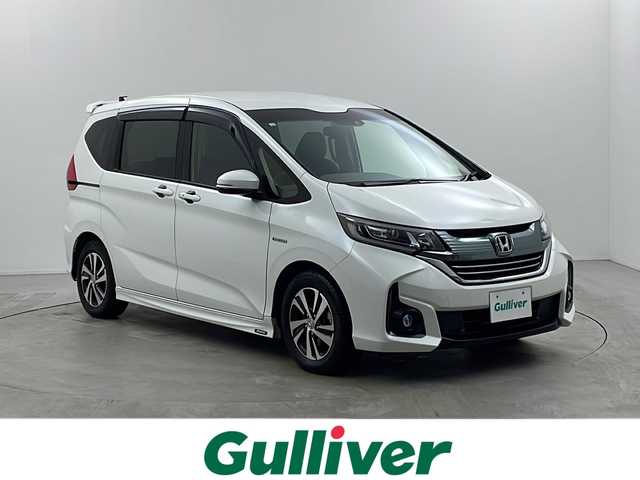 ホンダ フリード＋ ハイブリット EX 栃木県 2016(平28)年 7.9万km ホワイトオーキッドパール ワンオーナー/純正7インチワイドナビ/・フルセグTV/AM/FM/・Bluetooth/USB/HDMI/ホンダセンシング/・衝突軽減ブレーキ/・誤発進抑制/・アダプティブクルーズコントロール/・車線維持支援/・歩行者事故低減ステアリング/・先行者発進お知らせ/・標識認識/バックカメラ/両側パワースライドドア/ビルトインETC/ハーフレザーシート(合皮)/シートヒーター(D/N席)/ロールサンシェード(2列目)/LEDヘッドライト/フォグランプ/純正15インチアルミホイール/社外15インチアルミ4本積込(スタッドレス付)/純正フロアマット/サイド+カーテンエアバッグ/スマートキー×2本/保証書、取扱説明書