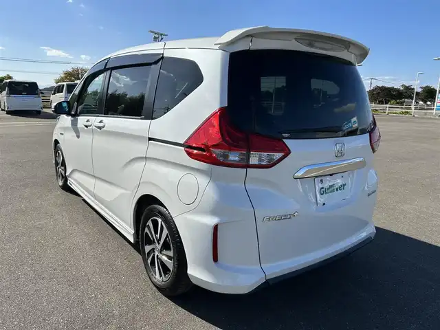 ホンダ フリード＋ ハイブリット EX 佐賀県 2016(平28)年 7.9万km ホワイトオーキッドパール ワンオーナー/純正7型ワイドナビ(フルセグTV/AM/FM/BT/USB/HDMI)/ホンダセンシング/衝突軽減ブレーキ/誤発進抑制/アダプティブクルーズコントロール/車線維持支援/歩行者事故低減ステアリング/先行者発進お知らせ/標識認識/バックカメラ/両側パワースライドドア/ビルトインETC/ハーフレザーシート(合皮)/シートヒーター(D/N席)/ロールサンシェード(2列目)/LEDヘッドライト/フォグランプ/フロントワイパーデアイサー/Moduloサイドエアロ/現状サマー(純正AW)(185/65/R15)/社外15インチアルミ4本積込(スタッドレス付)/スマートキー×2本/保証書、取扱説明書/DUNLOP ENASAVE RV505/BRIDGESTONE BLIZAK VRX2