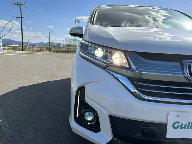 ホンダ フリード＋ ハイブリット EX 佐賀県 2016(平28)年 7.9万km ホワイトオーキッドパール ワンオーナー/純正7型ワイドナビ(フルセグTV/AM/FM/BT/USB/HDMI)/ホンダセンシング/衝突軽減ブレーキ/誤発進抑制/アダプティブクルーズコントロール/車線維持支援/歩行者事故低減ステアリング/先行者発進お知らせ/標識認識/バックカメラ/両側パワースライドドア/ビルトインETC/ハーフレザーシート(合皮)/シートヒーター(D/N席)/ロールサンシェード(2列目)/LEDヘッドライト/フォグランプ/フロントワイパーデアイサー/Moduloサイドエアロ/現状サマー(純正AW)(185/65/R15)/社外15インチアルミ4本積込(スタッドレス付)/スマートキー×2本/保証書、取扱説明書/DUNLOP ENASAVE RV505/BRIDGESTONE BLIZAK VRX2