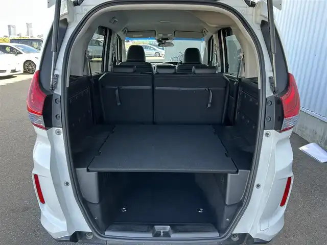 ホンダ フリード＋ ハイブリット EX 佐賀県 2016(平28)年 7.9万km ホワイトオーキッドパール ワンオーナー/純正7型ワイドナビ(フルセグTV/AM/FM/BT/USB/HDMI)/ホンダセンシング/衝突軽減ブレーキ/誤発進抑制/アダプティブクルーズコントロール/車線維持支援/歩行者事故低減ステアリング/先行者発進お知らせ/標識認識/バックカメラ/両側パワースライドドア/ビルトインETC/ハーフレザーシート(合皮)/シートヒーター(D/N席)/ロールサンシェード(2列目)/LEDヘッドライト/フォグランプ/フロントワイパーデアイサー/Moduloサイドエアロ/現状サマー(純正AW)(185/65/R15)/社外15インチアルミ4本積込(スタッドレス付)/スマートキー×2本/保証書、取扱説明書/DUNLOP ENASAVE RV505/BRIDGESTONE BLIZAK VRX2