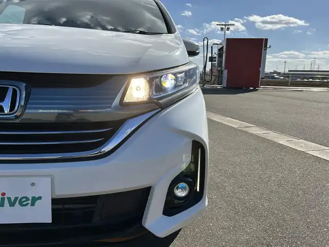 ホンダ フリード＋ ハイブリット EX 佐賀県 2016(平28)年 7.9万km ホワイトオーキッドパール ワンオーナー/純正7型ワイドナビ(フルセグTV/AM/FM/BT/USB/HDMI)/ホンダセンシング/衝突軽減ブレーキ/誤発進抑制/アダプティブクルーズコントロール/車線維持支援/歩行者事故低減ステアリング/先行者発進お知らせ/標識認識/バックカメラ/両側パワースライドドア/ビルトインETC/ハーフレザーシート(合皮)/シートヒーター(D/N席)/ロールサンシェード(2列目)/LEDヘッドライト/フォグランプ/フロントワイパーデアイサー/Moduloサイドエアロ/現状サマー(純正AW)(185/65/R15)/社外15インチアルミ4本積込(スタッドレス付)/スマートキー×2本/保証書、取扱説明書/DUNLOP ENASAVE RV505/BRIDGESTONE BLIZAK VRX2