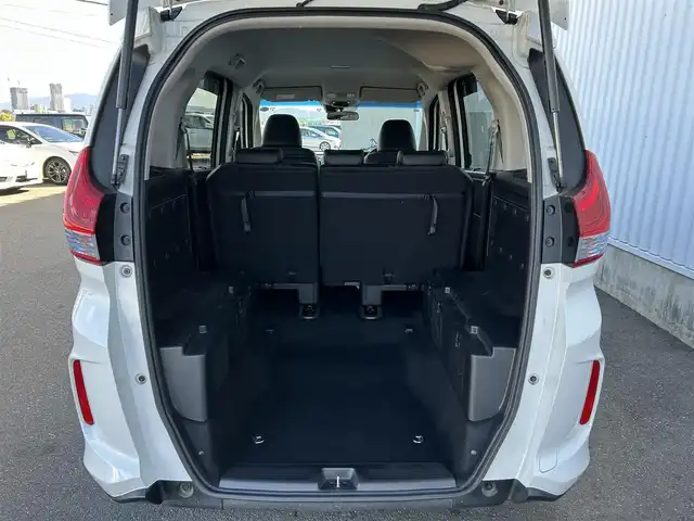 ホンダ フリード＋ ハイブリット EX 佐賀県 2016(平28)年 7.9万km ホワイトオーキッドパール ワンオーナー/純正7型ワイドナビ(フルセグTV/AM/FM/BT/USB/HDMI)/ホンダセンシング/衝突軽減ブレーキ/誤発進抑制/アダプティブクルーズコントロール/車線維持支援/歩行者事故低減ステアリング/先行者発進お知らせ/標識認識/バックカメラ/両側パワースライドドア/ビルトインETC/ハーフレザーシート(合皮)/シートヒーター(D/N席)/ロールサンシェード(2列目)/LEDヘッドライト/フォグランプ/フロントワイパーデアイサー/Moduloサイドエアロ/現状サマー(純正AW)(185/65/R15)/社外15インチアルミ4本積込(スタッドレス付)/スマートキー×2本/保証書、取扱説明書/DUNLOP ENASAVE RV505/BRIDGESTONE BLIZAK VRX2