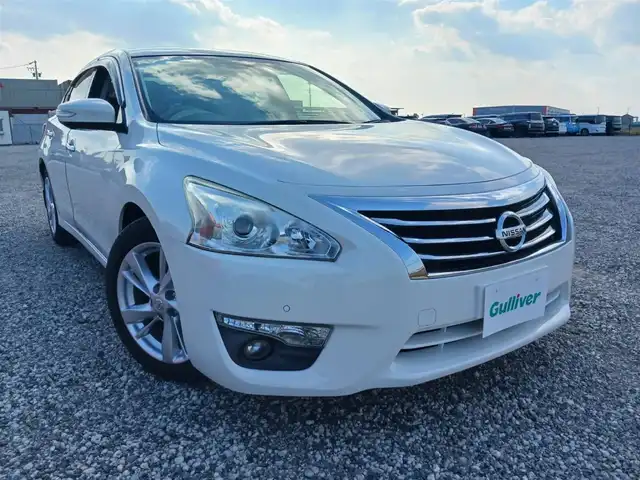 日産 ティアナ XV ナビAVMパッケージ 愛知県 2017(平29)年 7.2万km ブリリアントホワイトパール 純正ナビ/フルセグTV/アラウンドビューモニター/ビルトインETC/クルーズコントロール/前後ソナー機能/エマージェンシーブレーキ/誤発進抑制/車線逸脱警報/後方車両検知警報/HIDヘッドランプ/オートライト/フロントフォグランプ/革巻きステアリング/ステアリングスイッチ/ベージュ革シート/前席パワーシート/前席シートヒーター/エアシート/助手席パワーオットマン/純正17インチアルミホイール/スマートキー/プッシュエンジンスターター/禁煙車