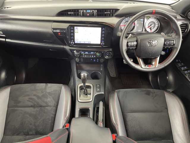 トヨタ ハイラックス 道央・札幌 2022(令4)年 1.9万km 白 　・４ＷＤ　/ディーゼル　ターボ/・純正ディスプレイオーディオ/・USB/AppleCarPlay/ナビ/・AndroidAuto/BT/・プリクラッシュセーフティー　/・レーンキープアシスト　/・パノラマミックビューモニター　/・荷台ハードカーバー（ダンパー付き）/・ダウンヒルアシストコントロール　/・センターでフロック　/・レーダークルーズコントロール/・MTモード付・パドルシフト/・ＥＴＣ/・ハーフレザーシート/・LEDオートライト/・スマートキー/スペアキー/・純正ハードトノカバー