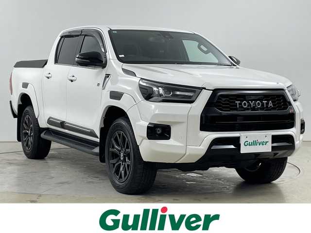 トヨタ ハイラックス 道央・札幌 2022(令4)年 1.9万km 白 　・４ＷＤ　/ディーゼル　ターボ/・純正ディスプレイオーディオ/・USB/AppleCarPlay/ナビ/・AndroidAuto/BT/・プリクラッシュセーフティー　/・レーンキープアシスト　/・パノラマミックビューモニター　/・荷台ハードカーバー（ダンパー付き）/・ダウンヒルアシストコントロール　/・センターでフロック　/・レーダークルーズコントロール/・MTモード付・パドルシフト/・ＥＴＣ/・ハーフレザーシート/・LEDオートライト/・スマートキー/スペアキー/・純正ハードトノカバー