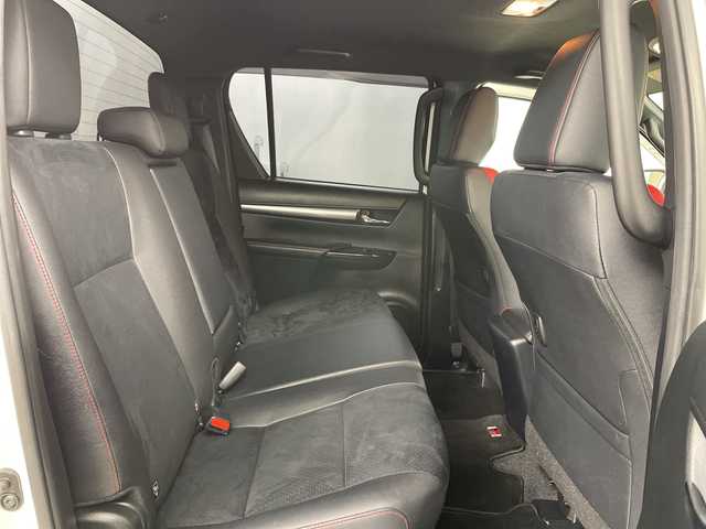 トヨタ ハイラックス 道央・札幌 2022(令4)年 1.9万km 白 　・４ＷＤ　/ディーゼル　ターボ/・純正ディスプレイオーディオ/・USB/AppleCarPlay/ナビ/・AndroidAuto/BT/・プリクラッシュセーフティー　/・レーンキープアシスト　/・パノラマミックビューモニター　/・荷台ハードカーバー（ダンパー付き）/・ダウンヒルアシストコントロール　/・センターでフロック　/・レーダークルーズコントロール/・MTモード付・パドルシフト/・ＥＴＣ/・ハーフレザーシート/・LEDオートライト/・スマートキー/スペアキー/・純正ハードトノカバー