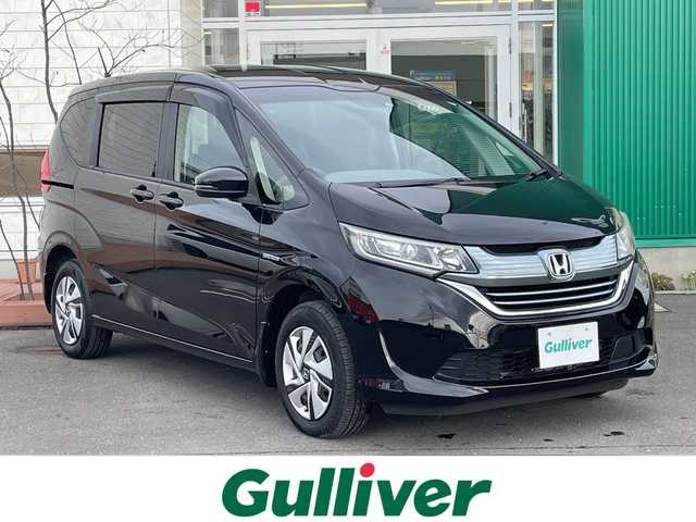 ホンダ フリード ハイブリット G ホンダセンシング 青森県 2016(平28)年 10.4万km クリスタルブラックパール 4WD/純正ディスプレイオーディオ・ワンセグTV/CD・Bluetooth・USB・HDMI/バックカメラ/前席シートヒーター/両側パワースライドドア/ホンダセンシング/衝突軽減ブレーキ/追従クルーズコントロール/レーンキープアシスト/ビルトインETC/ワイパーデアイサー/ヒーテッドドアミラー/LEDヘッドライト/オートライト/プッシュスタート/スマートキー