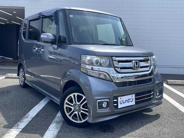 ホンダ Ｎ ＢＯＸ カスタム SSパッケージ 熊本県 2017(平29)年 6.4万km シャイニンググレーM (株)IDOMが運営する【じしゃロン熊本店】の自社ローン専用車両になりますこちらは現金またはオートローンご利用時の価格です。自社ローンご希望の方は別途その旨お申付け下さい/純正ナビ（フルセグ　CD　BT）　/バックカメラ　/両側パワースライドドア　/ステアリングスイッチ　/左右シートヒーター　/W+サイドエアバッグ　/プッシュスタート　/スマートキー　/電動格納ミラー