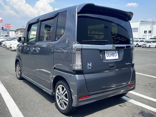 ホンダ Ｎ ＢＯＸ カスタム SSパッケージ 熊本県 2017(平29)年 6.4万km シャイニンググレーM (株)IDOMが運営する【じしゃロン熊本店】の自社ローン専用車両になりますこちらは現金またはオートローンご利用時の価格です。自社ローンご希望の方は別途その旨お申付け下さい/純正ナビ（フルセグ　CD　BT）　/バックカメラ　/両側パワースライドドア　/ステアリングスイッチ　/左右シートヒーター　/W+サイドエアバッグ　/プッシュスタート　/スマートキー　/電動格納ミラー