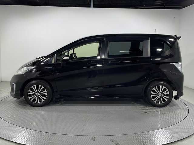 ホンダ フリード ハイブリット ジャストセレクション 広島県 2015(平27)年 5万km プレミアムスパークルブラックパール 純正ナビ/両側パワースライドドア/バックカメラ/クルーズコントロール/ハーフレザーシート/HIDヘッドランプ/ETC/ステアリングスイッチ/スマートキー