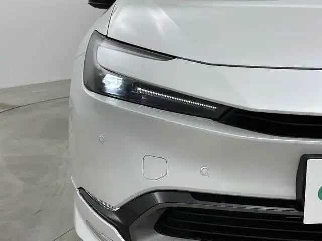 トヨタ プリウス Z 岡山県 2025(令7)年 0.9万km プラチナホワイトパールマイカ ガラスルーフ/モデリスタフルエアロ/純正12.3インチナビ /地デジ/BT/AppleCarPlay/USB/パノラミックビューモニター/ビルトインETC2.0/黒合皮シート/シートヒーター /ベンチレーション/レーダークルーズコントロール/ステアリングヒーター/BSM/デジタルインナーミラー/純正前後ドラレコ /シートメモリー/純正フロアマット/LEDヘッドライト