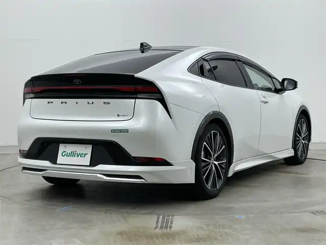 トヨタ プリウス Z 岡山県 2025(令7)年 0.9万km プラチナホワイトパールマイカ ガラスルーフ/モデリスタフルエアロ/純正12.3インチナビ /地デジ/BT/AppleCarPlay/USB/パノラミックビューモニター/ビルトインETC2.0/黒合皮シート/シートヒーター /ベンチレーション/レーダークルーズコントロール/ステアリングヒーター/BSM/デジタルインナーミラー/純正前後ドラレコ /シートメモリー/純正フロアマット/LEDヘッドライト