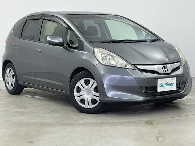 ホンダ フィット XH 新潟県 2013(平25)年 8万km ポリッシュドメタルメタリック 純正カーオーディオ/ステアリングスイッチ/ワイパーデアイサー/シートヒーター/ドアバイザー/ウィンカーミラー/電格ミラー/クルーズコントロール/純正フロアマット/ETC