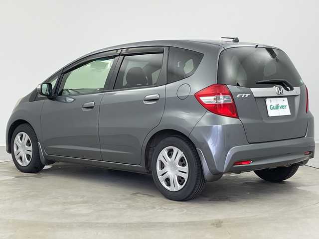 ホンダ フィット XH 新潟県 2013(平25)年 8万km ポリッシュドメタルメタリック 純正カーオーディオ/ステアリングスイッチ/ワイパーデアイサー/シートヒーター/ドアバイザー/ウィンカーミラー/電格ミラー/クルーズコントロール/純正フロアマット/ETC