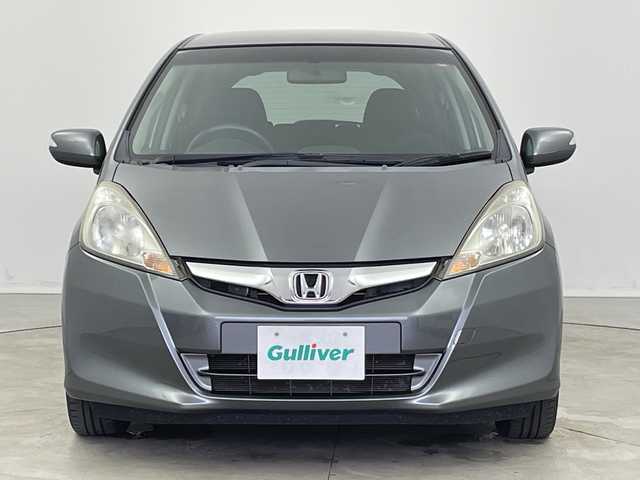 ホンダ フィット XH 新潟県 2013(平25)年 8万km ポリッシュドメタルメタリック 純正カーオーディオ/ステアリングスイッチ/ワイパーデアイサー/シートヒーター/ドアバイザー/ウィンカーミラー/電格ミラー/クルーズコントロール/純正フロアマット/ETC