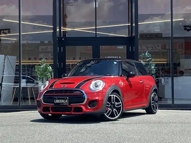 ＭＩＮＩ ミニ ジョンクーパーワークス 福岡県 2015(平27)年 6.4万km 赤 ・1オーナー/・クルーズコントロール/・純正HDDナビ/USB/Bluetooth/AUX/・シートヒーター/・ETC/・純正18AW/・プッシュスタート/・オートライト
