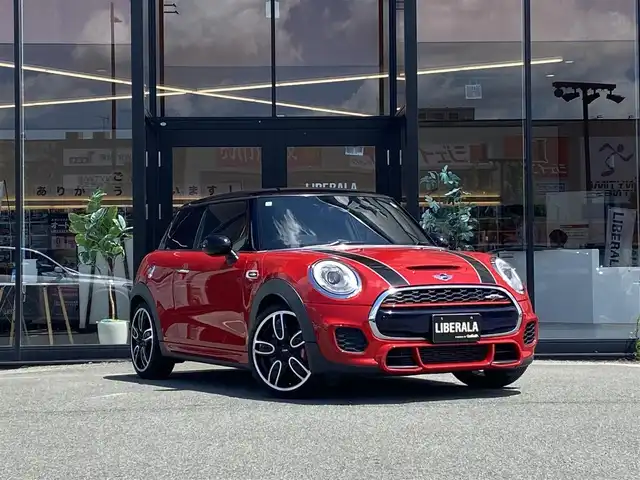 ＭＩＮＩ ミニ ジョンクーパーワークス 福岡県 2015(平27)年 6.4万km 赤 ・1オーナー/・クルーズコントロール/・純正HDDナビ/USB/Bluetooth/AUX/・シートヒーター/・ETC/・純正18AW/・プッシュスタート/・オートライト