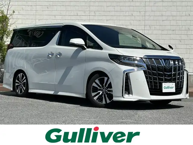 トヨタ アルファード S Cパッケージ 滋賀県 2022(令4)年 3万km ホワイトパールクリスタルシャイン TEIN製車高調(純正積込)/LEDリフレクター(純正積込)/両側パワースライドドア/9インチ純正ディスプレイオーディオ/(FM/AM//USB/Bluetooth)/バックカメラ/ETC/ＴＶキャンセラー/ＴｏｙｏｔａＳａｆｅｔｙＳｅｎｓｅ/・プリクラッシュブレーキアシスト	/・レーンキープアシスト	/・レーダークルーズコントロール/・標識検知機能	/電動リアゲート/電動格納ミラー/リバース連動ミラー/電子パーキング/ブレーキボールド/革巻きステアリング/ステアリングスイッチ/ステアリングヒーター/オートライト/LEDヘッドライト/フロントフォグ/オートマチックハイビーム/フルオートエアコン/オットマン/プッシュスタート/スマートキー/ドアバイザー/シートメモリー