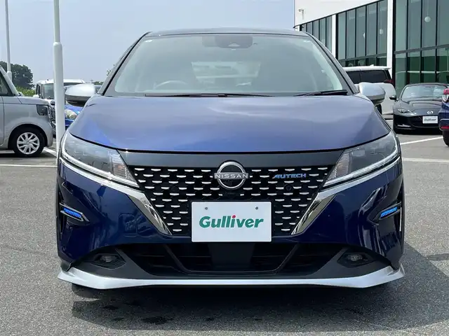 日産 ノート オーテック 奈良県 2021(令3)年 2万km オーロラフレアブルーパール /スーパーブラック 2トーン 純正ナビ(フルセグTV/CD/AM・FM/BT)/バックカメラ/ビルトインETC2.0/前方ドラレコ/衝突被害軽減ブレーキ/車線逸脱警報/VDC(ビークルダイナミクスコントロール)/オートブレーキホールド/LEDヘッドランプ/フォグランプ/純正16インチアルミホイール/本革巻きステアリング/レザレットシート/純正フロアマット/スペアキー