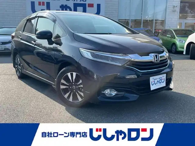 ホンダ シャトル ハイブリッド 東京都 2016(平28)年 8.1万km ミッドナイトブルービームM (株)IDOMが運営する【じしゃロン昭島店】の自社ローン専用車両になります。こちらは現金またはオートローンご利用時の価格です。自社ローンご希望の方は別途その旨お申付け下さい/衝突被害軽減システム/社外ナビ（TV・HDD・CD・DVD）/バックカメラ・フロント/純正AW/スマートキー/プッシュスタートボタン/純正フロアマット/ETC/ハーフレザーシート