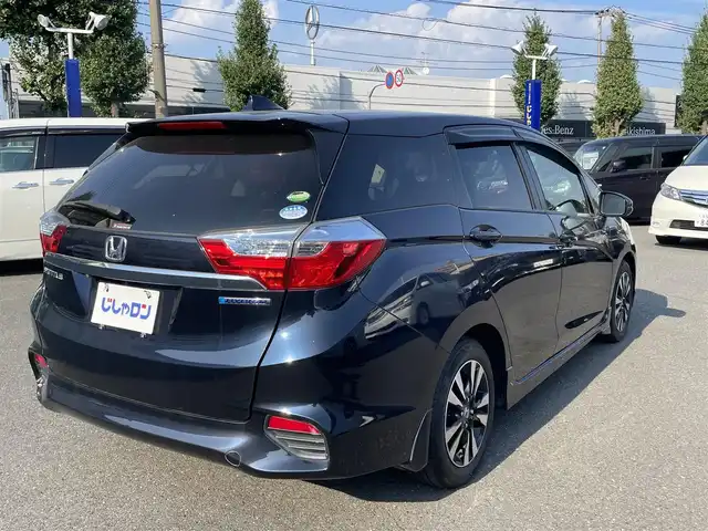 ホンダ シャトル ハイブリッド 東京都 2016(平28)年 8.1万km ミッドナイトブルービームM (株)IDOMが運営する【じしゃロン昭島店】の自社ローン専用車両になります。こちらは現金またはオートローンご利用時の価格です。自社ローンご希望の方は別途その旨お申付け下さい/衝突被害軽減システム/社外ナビ（TV・HDD・CD・DVD）/バックカメラ・フロント/純正AW/スマートキー/プッシュスタートボタン/純正フロアマット/ETC/ハーフレザーシート