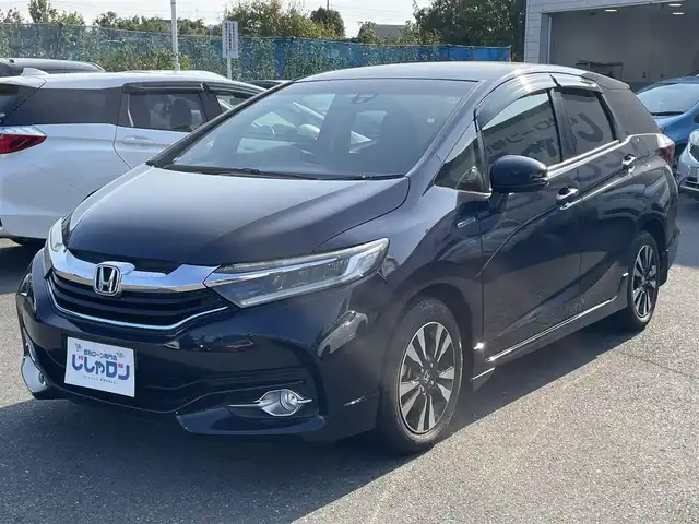 ホンダ シャトル ハイブリッド 東京都 2016(平28)年 8.1万km ミッドナイトブルービームM (株)IDOMが運営する【じしゃロン昭島店】の自社ローン専用車両になります。こちらは現金またはオートローンご利用時の価格です。自社ローンご希望の方は別途その旨お申付け下さい/衝突被害軽減システム/社外ナビ（TV・HDD・CD・DVD）/バックカメラ・フロント/純正AW/スマートキー/プッシュスタートボタン/純正フロアマット/ETC/ハーフレザーシート