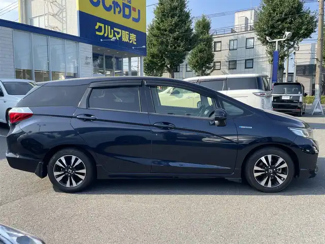 ホンダ シャトル ハイブリッド 東京都 2016(平28)年 8.1万km ミッドナイトブルービームM (株)IDOMが運営する【じしゃロン昭島店】の自社ローン専用車両になります。こちらは現金またはオートローンご利用時の価格です。自社ローンご希望の方は別途その旨お申付け下さい/衝突被害軽減システム/社外ナビ（TV・HDD・CD・DVD）/バックカメラ・フロント/純正AW/スマートキー/プッシュスタートボタン/純正フロアマット/ETC/ハーフレザーシート