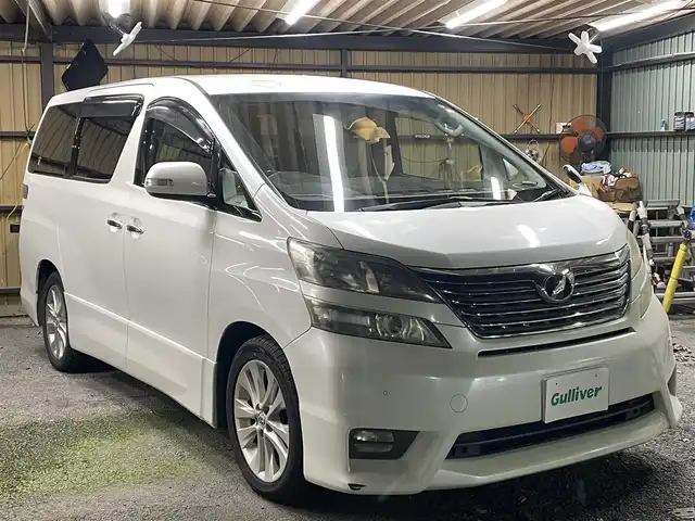 トヨタ ヴェルファイア 2．4Z 埼玉県 2008(平20)年 10.4万km ホワイトパールクリスタルシャイン 純正ＨＤＤナビ＆フルセグＴＶ/　（ＤＶＤ＆ＣＤ＆ＭＳＶ＆ＢＴ）/フリップダウンモニター/バックカメラ/ＥＴＣ/前方ドライブレコーダー/ウッドコンビステアリング/ステアリングリモコン/両側パワースライドドア/クリアランスソナー/純正エアロ/純正１８inアルミホイール/オートライト/ＨＩＤライト/フォグランプ/ウィンカーミラー/電動格納ミラー/Ｗ＆サイド＋カーテンエアバッグ/横滑り防止装置/ＡＢＳ/ドアバイザー/フロアマット/取扱説明書