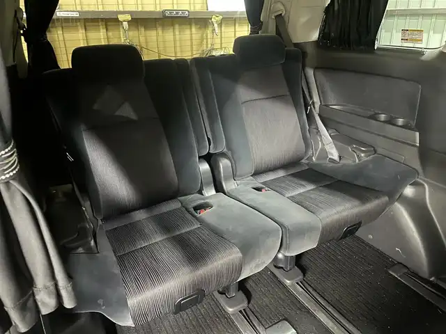 トヨタ ヴェルファイア 2．4Z 埼玉県 2008(平20)年 10.4万km ホワイトパールクリスタルシャイン 純正ＨＤＤナビ＆フルセグＴＶ/　（ＤＶＤ＆ＣＤ＆ＭＳＶ＆ＢＴ）/フリップダウンモニター/バックカメラ/ＥＴＣ/前方ドライブレコーダー/ウッドコンビステアリング/ステアリングリモコン/両側パワースライドドア/クリアランスソナー/純正エアロ/純正１８inアルミホイール/オートライト/ＨＩＤライト/フォグランプ/ウィンカーミラー/電動格納ミラー/Ｗ＆サイド＋カーテンエアバッグ/横滑り防止装置/ＡＢＳ/ドアバイザー/フロアマット/取扱説明書