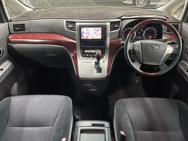 トヨタ ヴェルファイア 2．4Z 埼玉県 2008(平20)年 10.4万km ホワイトパールクリスタルシャイン 純正ＨＤＤナビ＆フルセグＴＶ/　（ＤＶＤ＆ＣＤ＆ＭＳＶ＆ＢＴ）/フリップダウンモニター/バックカメラ/ＥＴＣ/前方ドライブレコーダー/ウッドコンビステアリング/ステアリングリモコン/両側パワースライドドア/クリアランスソナー/純正エアロ/純正１８inアルミホイール/オートライト/ＨＩＤライト/フォグランプ/ウィンカーミラー/電動格納ミラー/Ｗ＆サイド＋カーテンエアバッグ/横滑り防止装置/ＡＢＳ/ドアバイザー/フロアマット/取扱説明書