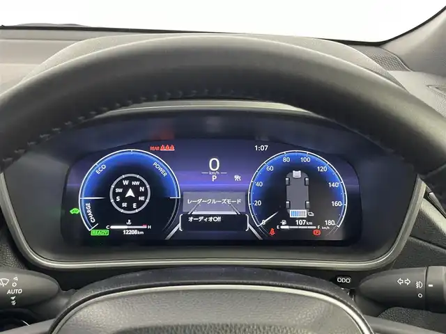 トヨタ カローラ クロス ハイブリッド Z 埼玉県 2025(令7)年 1.3万km 赤 パノラマルーフ　純正ディスプレイオーディオ　パノラミックビューモニター　ＢＳＭ　セーフティセンス　レーダークルーズ　ビルトインＥＴＣ２．０　シートヒーター　ワイヤレス充電　オートハイビーム　ＬＥＤ