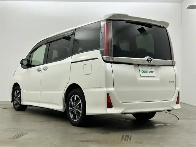 トヨタ ノア Si ダブルバイビーⅡ 岡山県 2019(令1)年 5.1万km ホワイトパールクリスタルシャイン 純正10インチナビ（NSZN-Z68T）/・FM/AM/Bluetooth/フルセグ/CD/DVD/バックカメラ/12.1インチフリップダウンモニター/両側電動スライドドア/ハーフレザーシート/ドライブレコーダー/ビルトインETC2.0/トヨタセーフティーセンス/・プリクラッシュセーフティ/・レーンキープアシスト/・レーダークルーズコントロール/・オートマチックハイビーム/LEDヘッドライト/・フォグライト/純正16インチアルミ/フロアマット