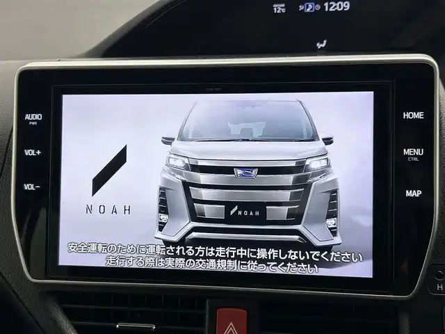 トヨタ ノア Si ダブルバイビーⅡ 岡山県 2019(令1)年 5.1万km ホワイトパールクリスタルシャイン 純正10インチナビ（NSZN-Z68T）/・FM/AM/Bluetooth/フルセグ/CD/DVD/バックカメラ/12.1インチフリップダウンモニター/両側電動スライドドア/ハーフレザーシート/ドライブレコーダー/ビルトインETC2.0/トヨタセーフティーセンス/・プリクラッシュセーフティ/・レーンキープアシスト/・レーダークルーズコントロール/・オートマチックハイビーム/LEDヘッドライト/・フォグライト/純正16インチアルミ/フロアマット