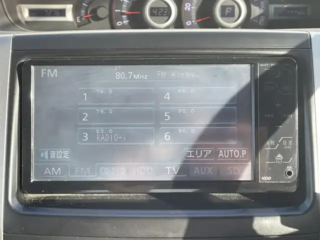 トヨタ ヴォクシー ZS 煌 愛知県 2009(平21)年 7.3万km ブラック 寒冷地仕様/ワイパーデアイサー/純正HDDナビ/バックカメラ/フルセグTV/フリップダウンモニター/CD/DVD再生/ETC/AUX接続/両側パワースライドドア/純正フロアマット/ウォークスルー/純正16インチアルミホイール/パドルシフト/HIDヘッドライト/オートライト