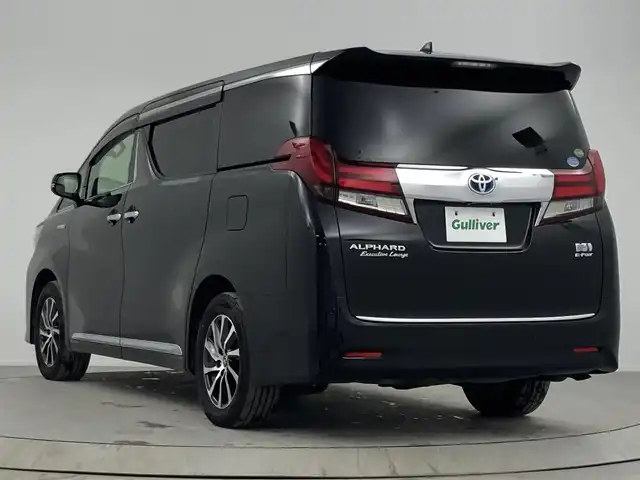 トヨタ アルファードハイブリット エグゼクティブ ラウンジ 熊本県 2016(平28)年 5万km ブラック 登録時走行距離49.159km/純正ナビ/(AM/FM/SD/TV/Bluetooth)/純正12.1インチフリップダウンモニター/パノラミックビューモニター/JBLプレミアムサウンドシステム/インテリジェントクリアランスソナー/トヨタセーフティセンス/・プリクラッシュセーフティ/・レーンディパーチャーアラート/・アダプティブクルーズコントロール/・オートマチックハイビーム/シートメモリー/シートヒーター/ステアリングヒーター/両側パワースライドドア/4WD/プッシュスタート/スマートキー