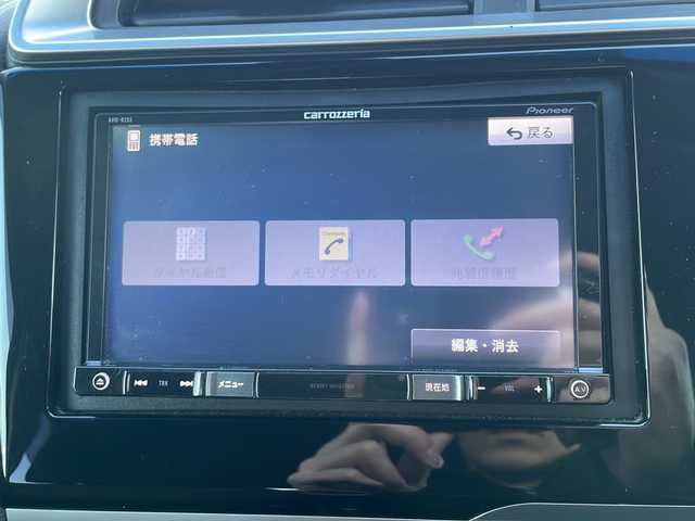 ホンダ フィット ハイブリット Fパッケージ 道東・釧路十勝 2016(平28)年 10.8万km タフホワイトⅡ 4WD/社外メモリナビ　/ＤＶＤ再生　/Ｂｌｕｅｔｏｏｔｈ　/ＥＴＣ　/バックカメラ　/横滑り防止装置/アイドリングストップ/スマートキー　/プッシュスタート　/社外１５インチアルミホイール　/社外フロアマット/サマータイヤ積み込み/・185/60/R15/・溝4ミリ