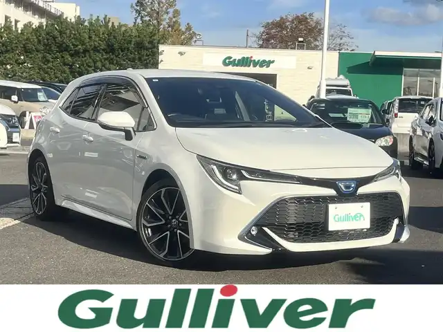 トヨタ カローラ スポーツ ハイブリッドG Z 島根県 2019(令1)年 6万km ホワイトパールクリスタルシャイン ワンオーナー　/社外ＳＤナビ　/フルセグＴＶ　/ＤＶＤ再生　/Ｂｌｕｅｔｏｏｔｈ接続　/バックカメラ　/ＥＴＣ　/レーダークルーズコントロール/衝突軽減ブレーキ/レーンキープアシスト/オートハイビーム／ライト　/スマートキー　/アイドリングストップ/純正LEDヘッドライト　/純正１８インチアルミホイール/純正フロアマット/保証書・取扱説明書/スペアキー1本