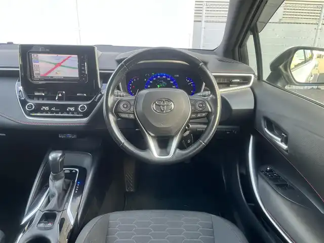 トヨタ カローラ スポーツ ハイブリッドG Z 島根県 2019(令1)年 6万km ホワイトパールクリスタルシャイン ワンオーナー　/社外ＳＤナビ　/フルセグＴＶ　/ＤＶＤ再生　/Ｂｌｕｅｔｏｏｔｈ接続　/バックカメラ　/ＥＴＣ　/レーダークルーズコントロール/衝突軽減ブレーキ/レーンキープアシスト/オートハイビーム／ライト　/スマートキー　/アイドリングストップ/純正LEDヘッドライト　/純正１８インチアルミホイール/純正フロアマット/保証書・取扱説明書/スペアキー1本