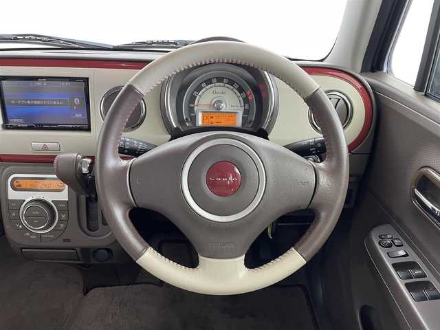 スズキ ラパン ショコラ X 大分県 2014(平26)年 6.2万km シャンパンピンクPM ECLIPSE製ナビゲーション/・Bluetooth・フルセグTV/・AM・FM・DVD・CD/バックカメラ/ETC/純正フロアマット/アイドリングストップ/ドアバイザー/オートライト/ウインカーミラー/革巻きステアリング/プッシュスタート/スマートキー/パワーウィンドウ/パワーステアリング/電動格納ミラー