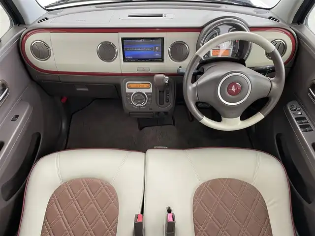 スズキ ラパン ショコラ X 大分県 2014(平26)年 6.2万km シャンパンピンクPM ECLIPSE製ナビゲーション/・Bluetooth・フルセグTV/・AM・FM・DVD・CD/バックカメラ/ETC/純正フロアマット/アイドリングストップ/ドアバイザー/オートライト/ウインカーミラー/革巻きステアリング/プッシュスタート/スマートキー/パワーウィンドウ/パワーステアリング/電動格納ミラー