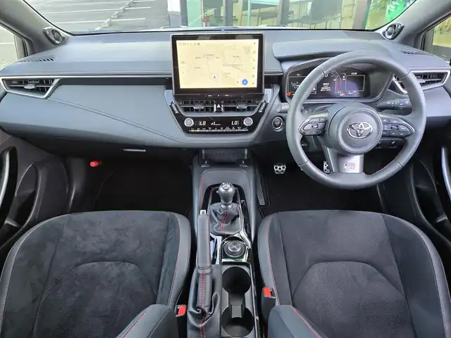 トヨタ ＧＲカローラ RZ 東京都 2024(令6)年 0.9万km プラチナホワイトパールマイカ 4WD/6MT/純正ディスプレイオーディオ/コネクトナビ/フルセグテレビ/トヨタセーフティセンス/純正BBS製18インチアルミホイール/カラードキャリパー/シートヒーター/ETC2.0/ハンドルヒーター/オートマチックハイビーム/レーダークルーズコントロール/GR純正フロアマット/カーボンルーフ/3本出しマフラー