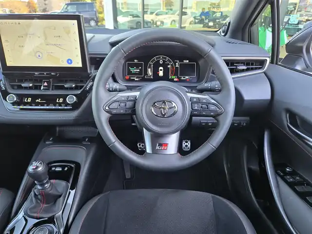 トヨタ ＧＲカローラ RZ 東京都 2024(令6)年 0.9万km プラチナホワイトパールマイカ 4WD/6MT/純正ディスプレイオーディオ/コネクトナビ/フルセグテレビ/トヨタセーフティセンス/純正BBS製18インチアルミホイール/カラードキャリパー/シートヒーター/ETC2.0/ハンドルヒーター/オートマチックハイビーム/レーダークルーズコントロール/GR純正フロアマット/カーボンルーフ/3本出しマフラー