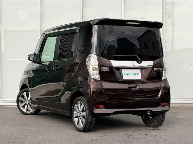 三菱 ｅＫスペース カスタムT e－アシスト 神奈川県 2015(平27)年 7.1万km ショコラブラウンP ・ターボ　/・衝突軽減ブレーキ　/・両側パワースライドドア　/・社外ナビＴＶ（Ｂｌｕｔｏｏｔｈ／ＤＶＤ／ＳＤ／フルセグ）/・バックカメラ　/・後席サーキュレーター　/・後席サンシェード/・純正ＬＥＤヘッドライト　/・スマートキー