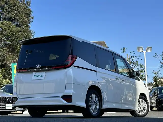 トヨタ ノア S－G 東京都 2024(令6)年 1万km ホワイトパールクリスタルシャイン 純正SDナビ/・Bluetoothオーディオ/USBオーディオ/・AppleCarPlay/AndroidAuto/バックカメラ/両側パワースライドドア/ビルトインETC2.0/純正フロアマット/取扱説明書/保証書/スペアキー1本