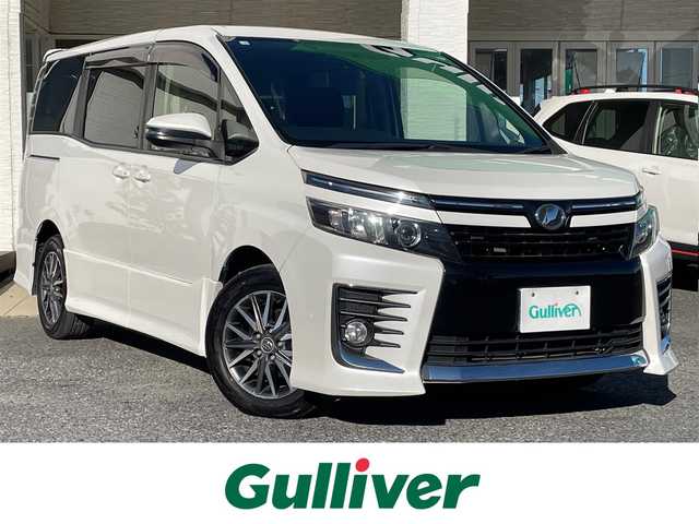 トヨタ ヴォクシー ZS 千葉県 2014(平26)年 8.1万km ホワイトパールクリスタルシャイン 両側パワースライドドア/社外ナビ（NSZT-Y62G）/　CD/DVD/Bluetooth/フルセグ/バックカメラ/ETC/LEDオートライト/フォグライト/16インチアルミホイール/ロールサンシェード/ウィンカーミラー/スペアキー/ワンオーナー