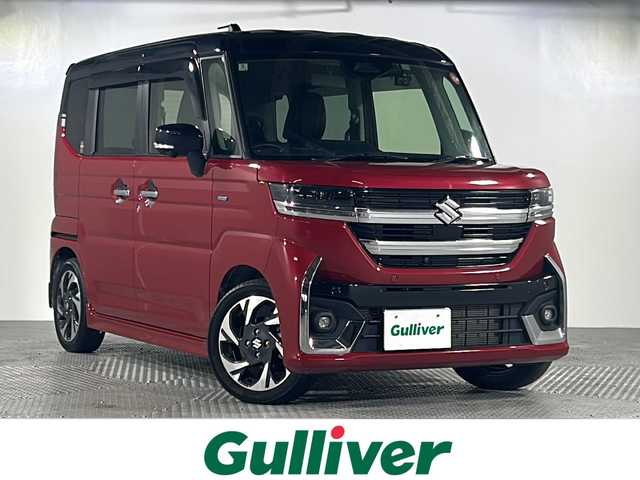 スズキ スペーシア カスタム HYBRID XS ターボ 沖縄県 2024(令6)年 1.7万km フェニックスレッドパール/ブルーイッシュブラックパール 禁煙車　/純正９インチナビ　/BT/フルセグTV/ラジオ/カープレイ/全方位カメラ　/社外ドライブレコーダー　/レーダークルーズコントロール/ステアリングヒーター　/オートホールド/ヘッドアップディスプレイ　/レザーシートカバー　/シートヒーター　/オットマン　/両側パワースライドドア　/衝突軽減　/前後コーナーセンサー/純正LEDヘッドライト
