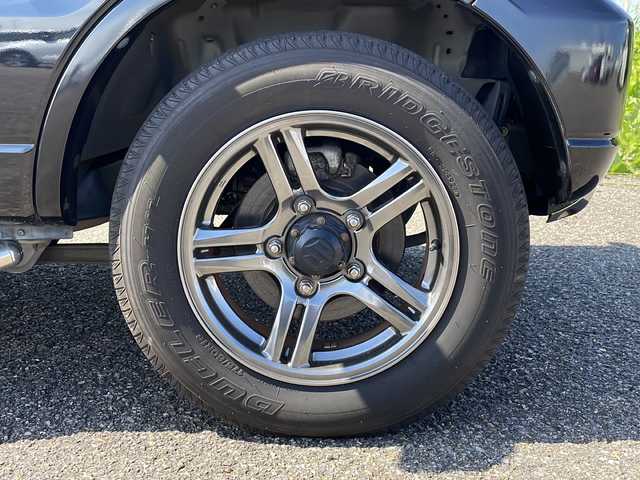 スズキ ジムニー ランドベンチャー 新潟県 2015(平27)年 5.5万km ブルーイッシュブラックパール3 4WD/社外SDナビ(CN-R300D)/CD/DVD/BT/フルセグテレビ/ETC/半革シート/運転席シートヒーター /ミラーヒーター/リモコンキー /フォグランプ/純正16インチアルミホイール