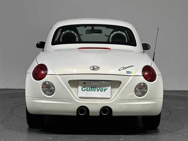 ダイハツ コペン ULTIMATE EDITION 愛媛県 2006(平18)年 8.9万km ホワイトパールマイカ ・ナビ（ワンセグＴＶ・ＣＤ・ＤＶＤ・ＦＭ・ＡＭ）/・ＥＴＣ　/・ＤＮ席シートヒーター　/・アクティブトップ　/・シガーソケット　/・電格ミラー