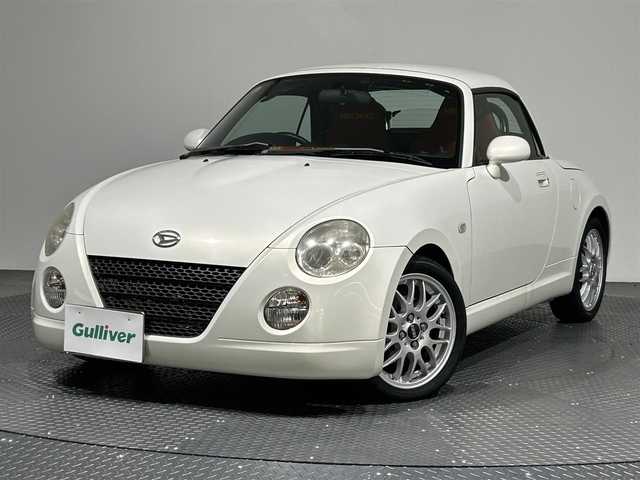 ダイハツ コペン ULTIMATE EDITION 愛媛県 2006(平18)年 8.9万km ホワイトパールマイカ ・ナビ（ワンセグＴＶ・ＣＤ・ＤＶＤ・ＦＭ・ＡＭ）/・ＥＴＣ　/・ＤＮ席シートヒーター　/・アクティブトップ　/・シガーソケット　/・電格ミラー